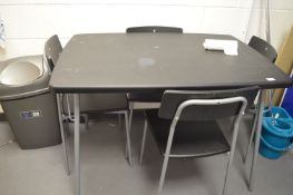 *Contemporary Style Plastic Table and Four Chairs