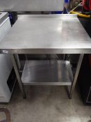 * S/S prepbench with upstand and undershelf. 700w x 650d x 900h