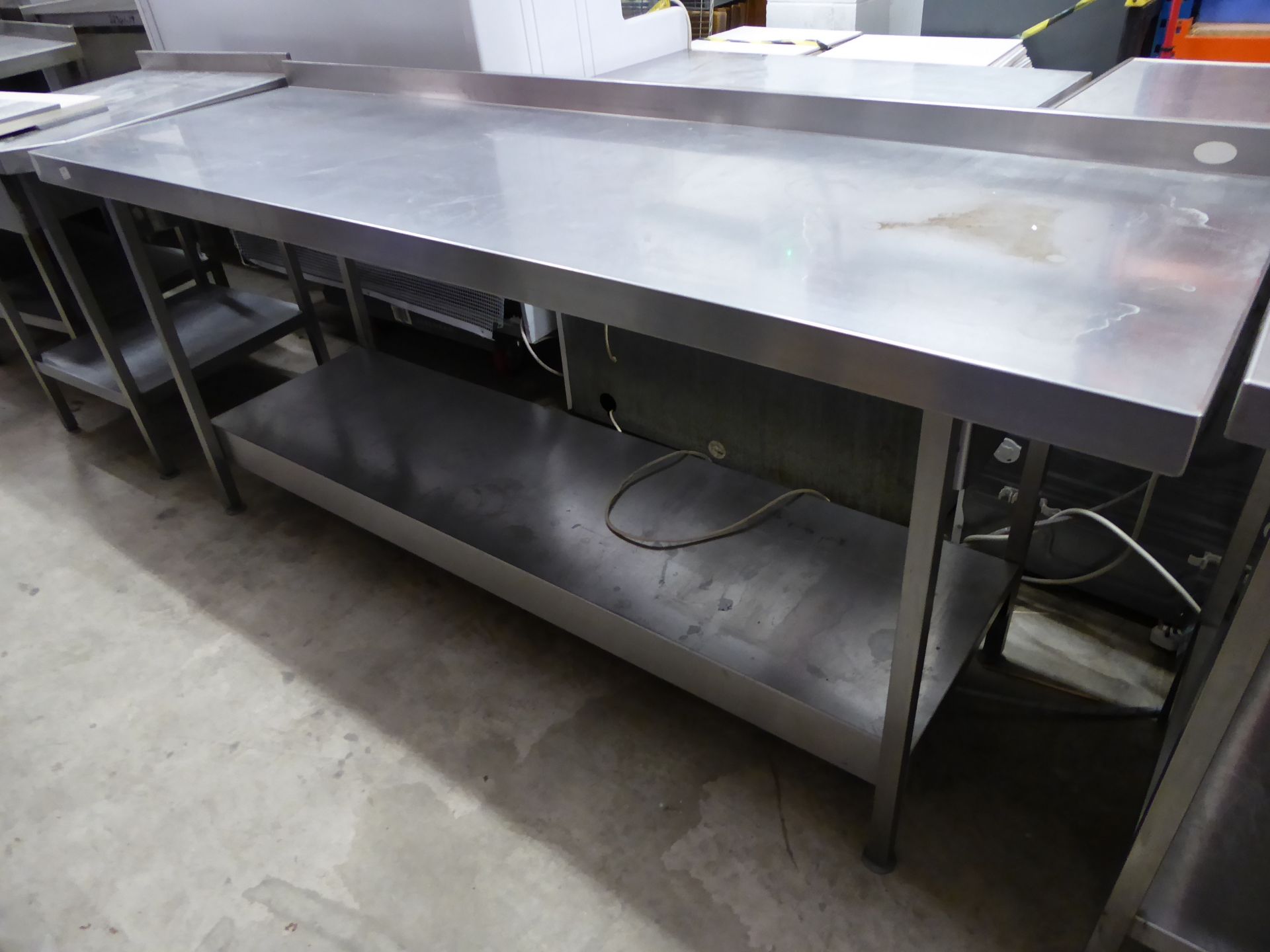 * S/S prepbench with upstand and undershelf. 2100w x 650d x 900h