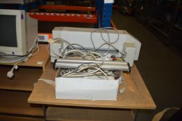 *Roller Paper Printer ND2700 on Table with Accessories