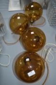Four Brown Glass Pendant Lamps