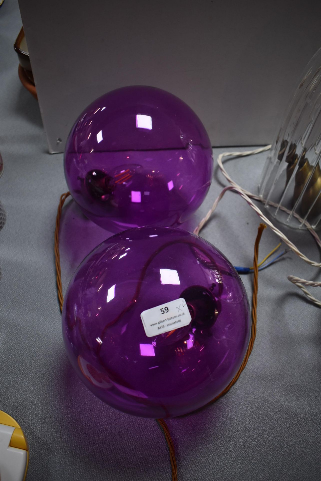 Two Purple Glass Pendant Lamps