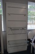 *White Shop Display Wall Panel with Glass Shelving and Stainless Steel Brackets