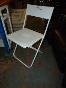 *Five Ikea White Plastic Folding Chairs
