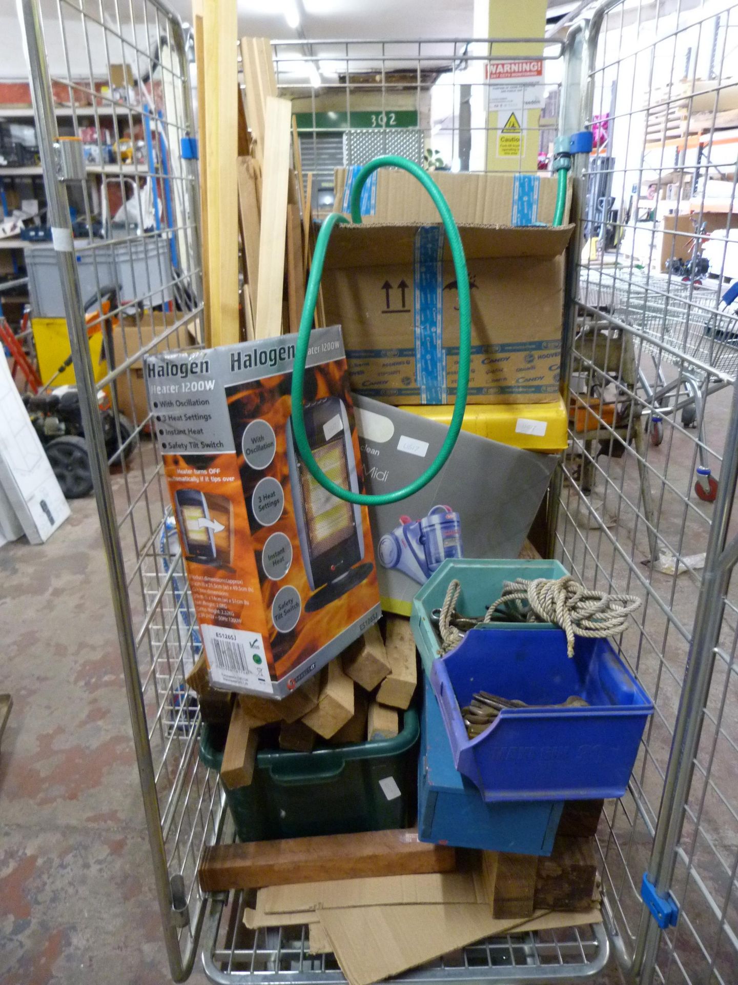 Cage Containing Various Pieces of Timber, Tools, V