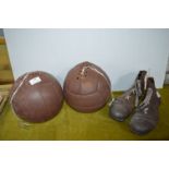 Two Leather Footballs and a Pair of Boots