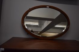 Beveled Glass Oval Mirror in Inlaid Mahogany Frame