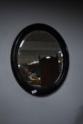 Ebonised Framed Beveled Glass Oval Mirror