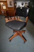 Rolling Desk Chair on Mahogany Base with Half Leather Upholstered Seat and Back