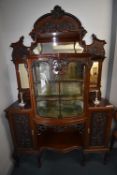 Victorian Glazed Display Unit with Carved Panels, Beveled Glass Mirrors, and Carved Cabriole Legs