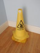 *Three Caution “Slippery Surface” Cones