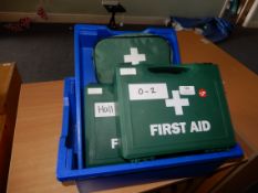 *Three Assorted First Aid Kits and Two Blue Storage Trays