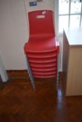 *Seven Red Stackable Chairs