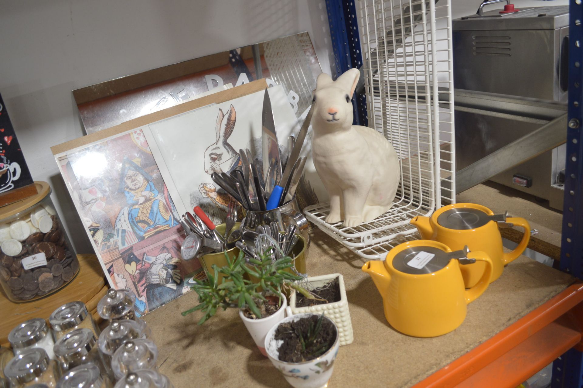 *Two For Life Fusion Teapots, Quantity of Cutlery, Drawings of a White Rabbit, White Steel Shelving,