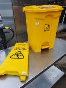 * yellow pedal bin and 2 x wet floor signs
