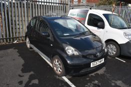 *Toyota Aygo (manual, three door, black) Reg: SG57 MVF, Mileage: 101973