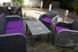 *4pc Rattan Patio Set Comprising Two Seat Sofa, Two Chairs, and Occasional Table