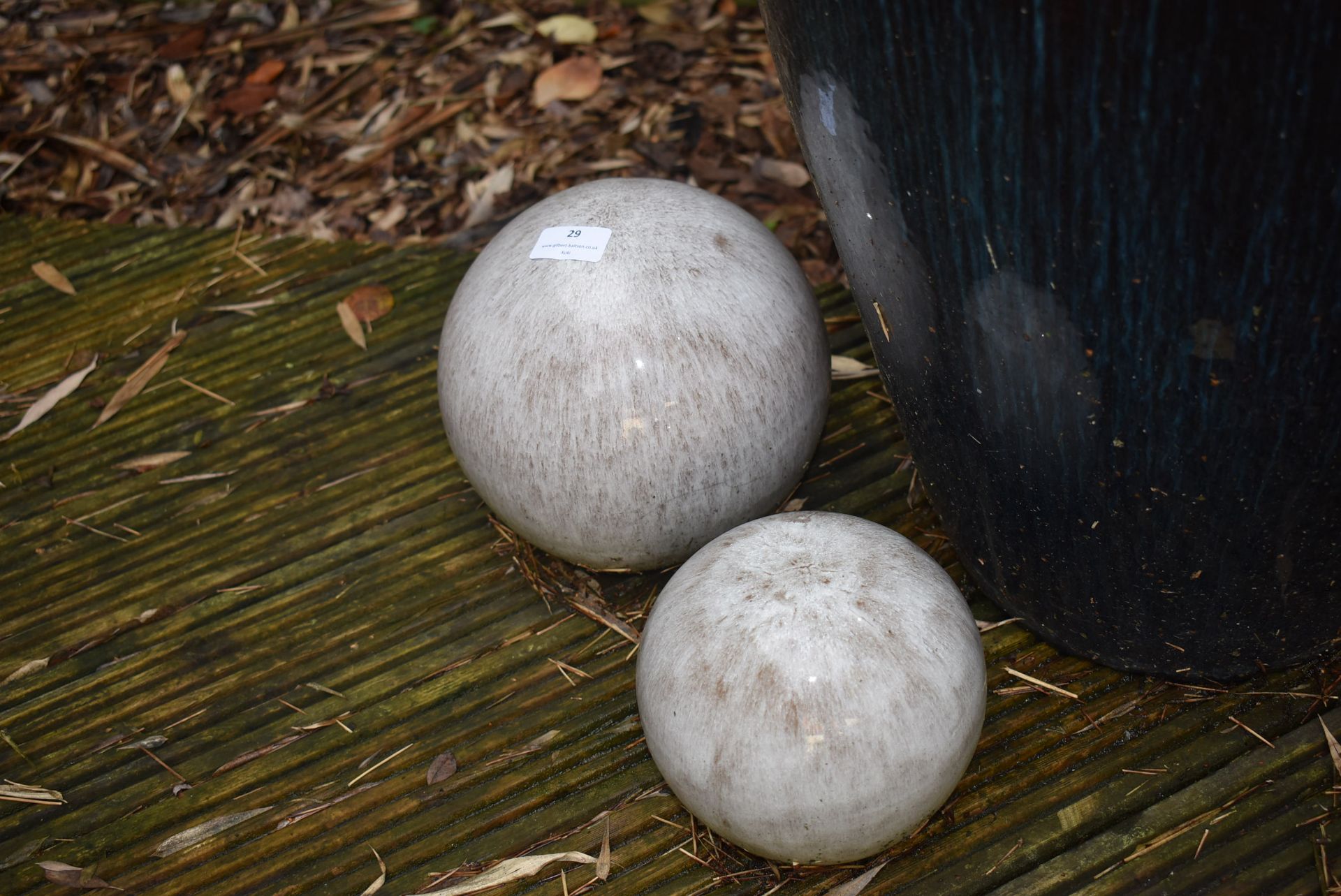 *Two Glazed Ceramic Spheres