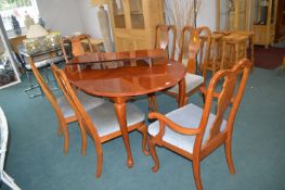 Oval Extending Dining Table with Six Chairs