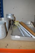 * Four Aluminium Milk Jugs, Cooking Tray, Plastic Spoons, and a Rolling Pin