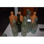 Collection of Six Glass and The Norfolk Punch Stoneware Bottles