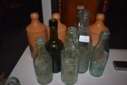Collection of Six Glass and The Norfolk Punch Stoneware Bottles