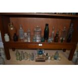 Shelf and Undershelf of Various Glass Bottles ~33 total