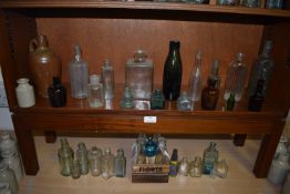 Shelf and Undershelf of Various Glass Bottles ~33 total