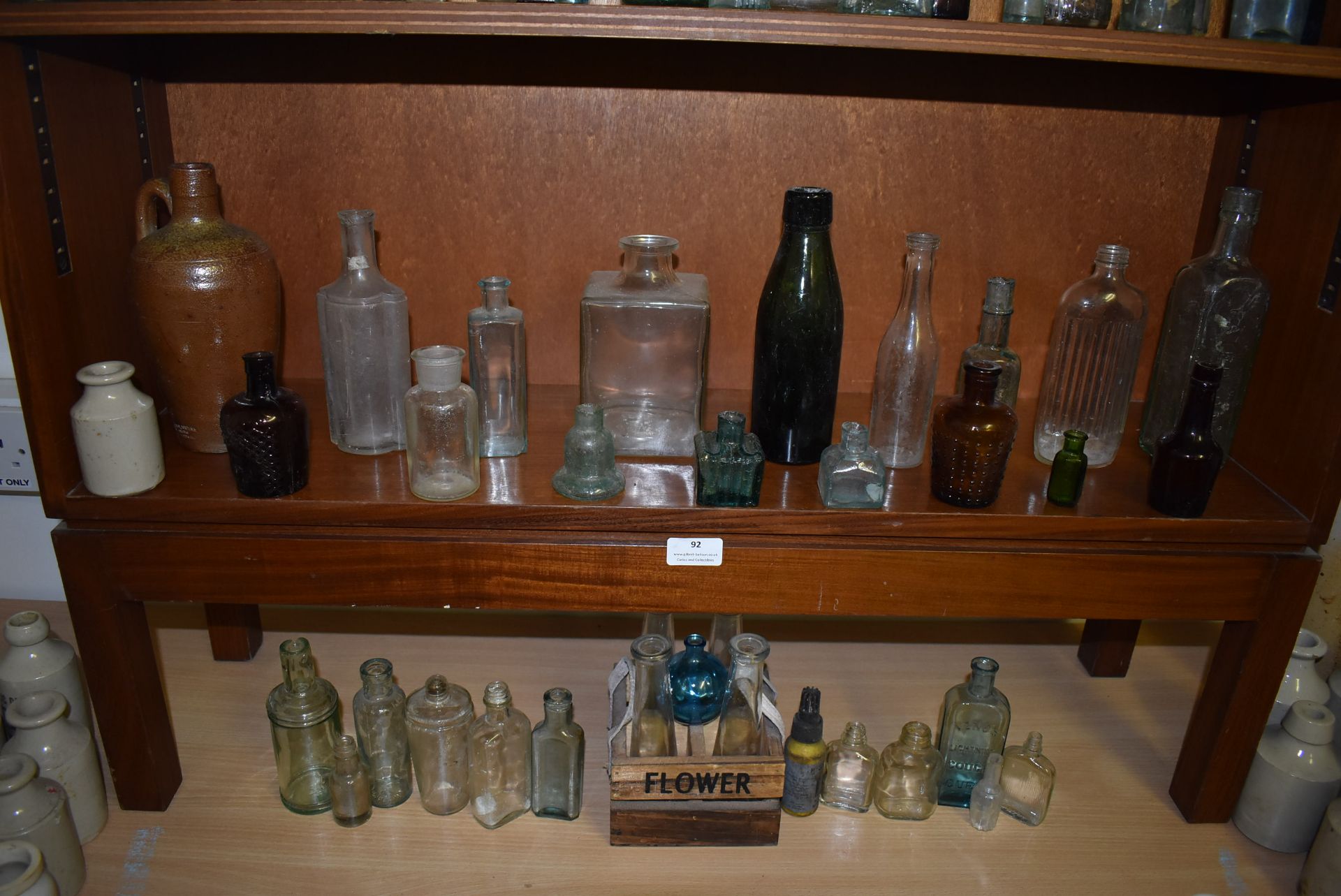 Shelf and Undershelf of Various Glass Bottles ~33 total