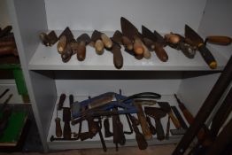 Two Shelves of Trowels, Screwdriver, Chisels, Tyre Pump, etc.