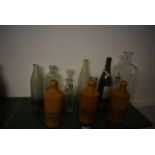 Collection of Glass Bottles and Three Norfolk Punch Stoneware Bottles