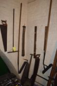 Items on Wall; Draining Rods, Angled Hoe, Saws, etc.