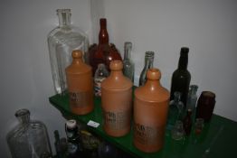 Collection of Glass Bottles and Three Norfolk Punch and One Other Stoneware Bottles