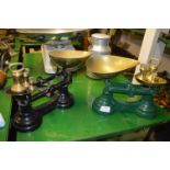 Two Sets of Two Cast Iron Scales with Brass Weights