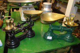 Two Sets of Two Cast Iron Scales with Brass Weights