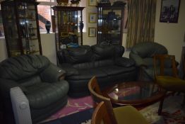 Two Green Leather Armchairs and a Grey Two Seat Sofa