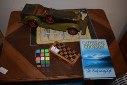 Travel Game, Rubik’s Cube, Wooden Toy Car, and Book