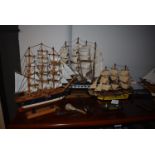 Four Wooden Model Boats; Mayflower, HMS Victory, and Two Scrat Built, plus a Metal Figure of a Man