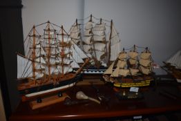 Four Wooden Model Boats; Mayflower, HMS Victory, and Two Scrat Built, plus a Metal Figure of a Man