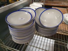 * white with blue rim bowls and plates - approx 30 items