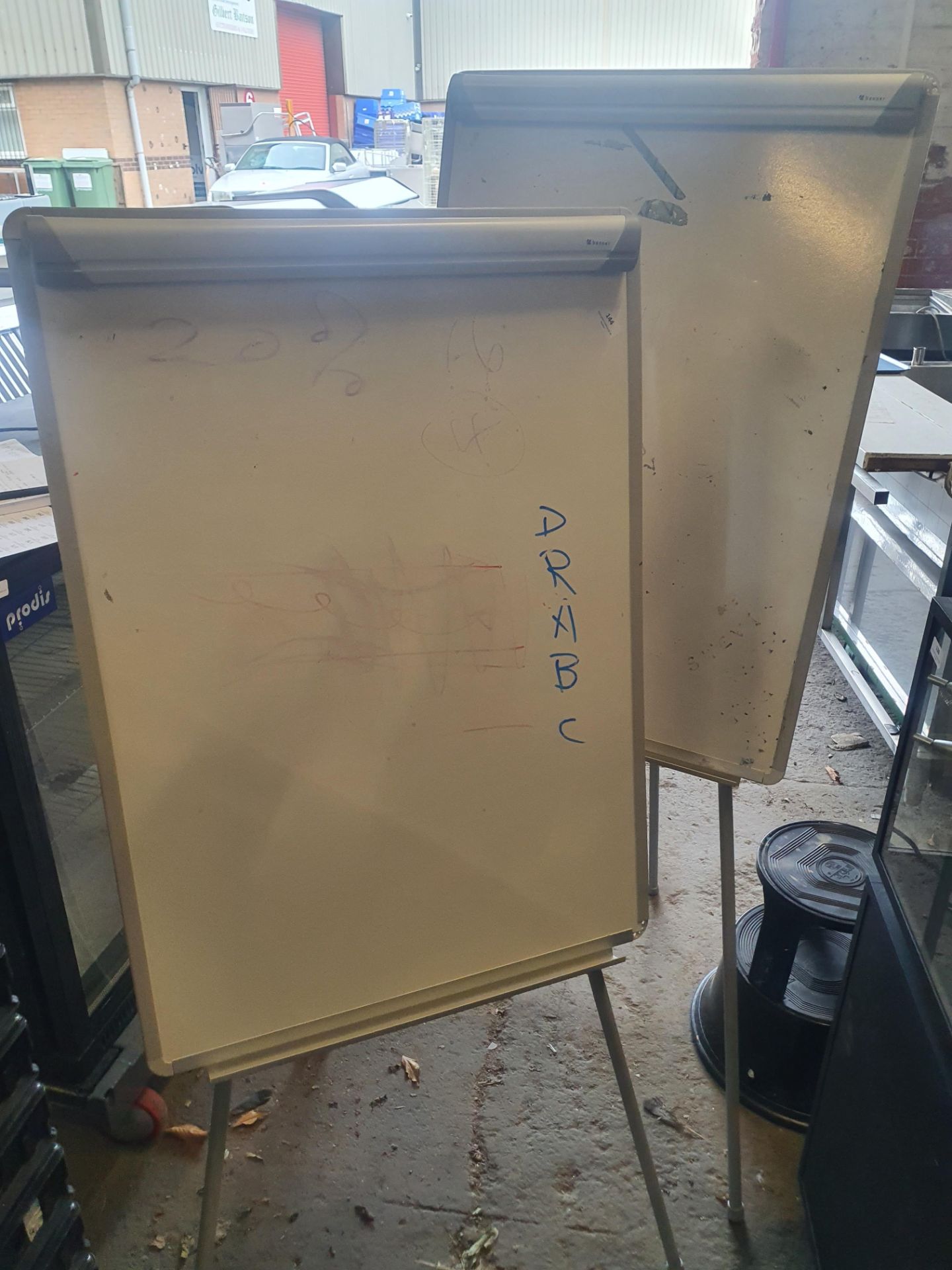 * 2 x white boards on adjustable stands with clip