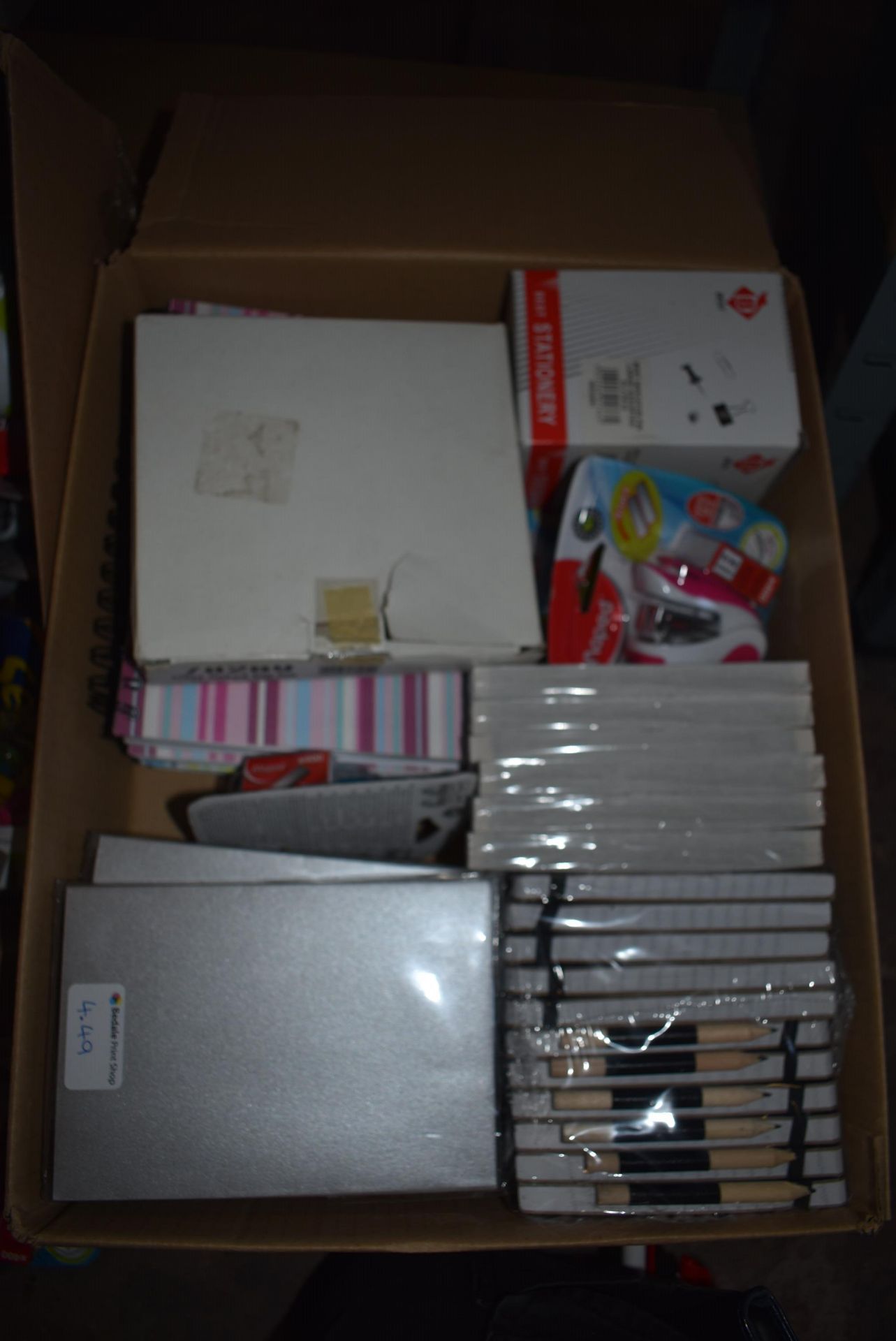 *Box of Notepads, Envelopes, Staplers, etc.