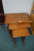 Nest of Three Mahogany Tables