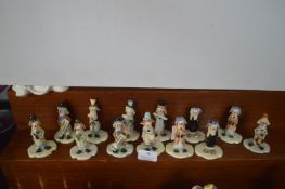 Thirteen Small Handmade Pottery Clown Figures