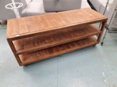 * wooden display table on castors