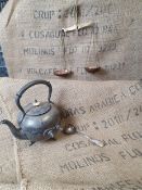 * cast tea pot, spoon and hanging scales