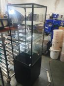 * upright glass display case