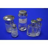 Five Glass Jars with Hallmarked Sterling Silver Li