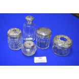 Five Glass Jars with Hallmarked Sterling Silver Li