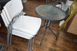 *Glass Topped Bistro Table and Three Metal Framed Plastic Chairs